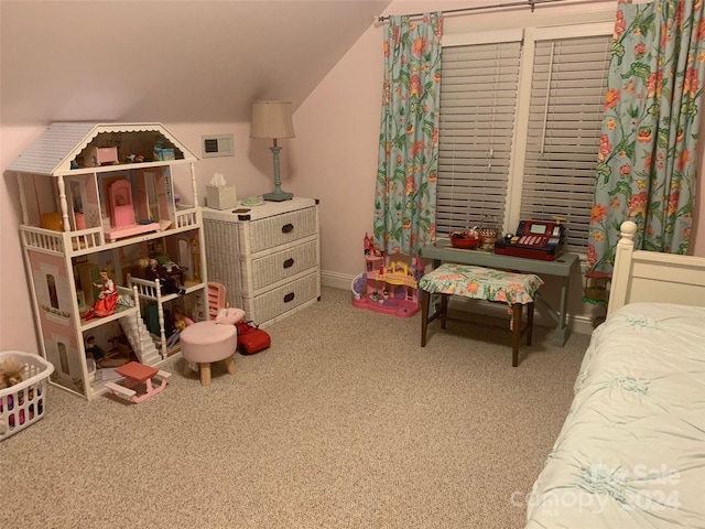 bedroom featuring carpet flooring and vaulted ceiling