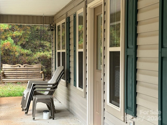 exterior space featuring covered porch