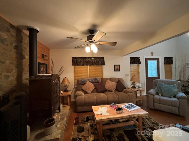 369 Pinecrest Cir, Troy, NC 27371 - living room featuring a ceiling fan, wood finished floors, and a wood stove