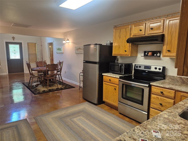 369 Pinecrest Cir, Troy, NC 27371 - kitchen featuring stainless steel appliances, under cabinet range hood, concrete flooring, and light stone counters
