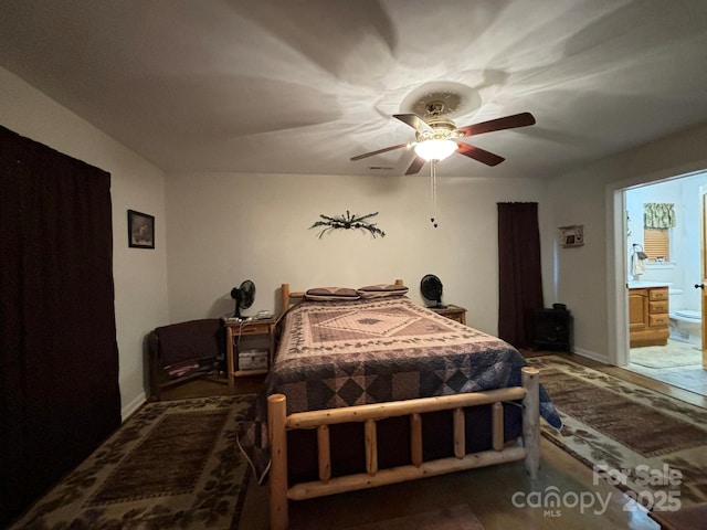 369 Pinecrest Cir, Troy, NC 27371 - bedroom with a ceiling fan and connected bathroom