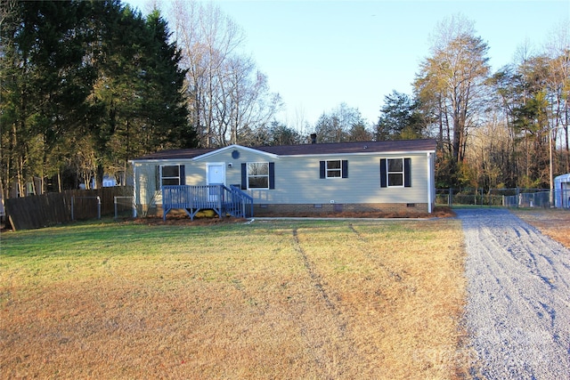 view of front facade featuring a front yard