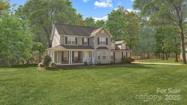 view of front facade featuring a porch and a front lawn