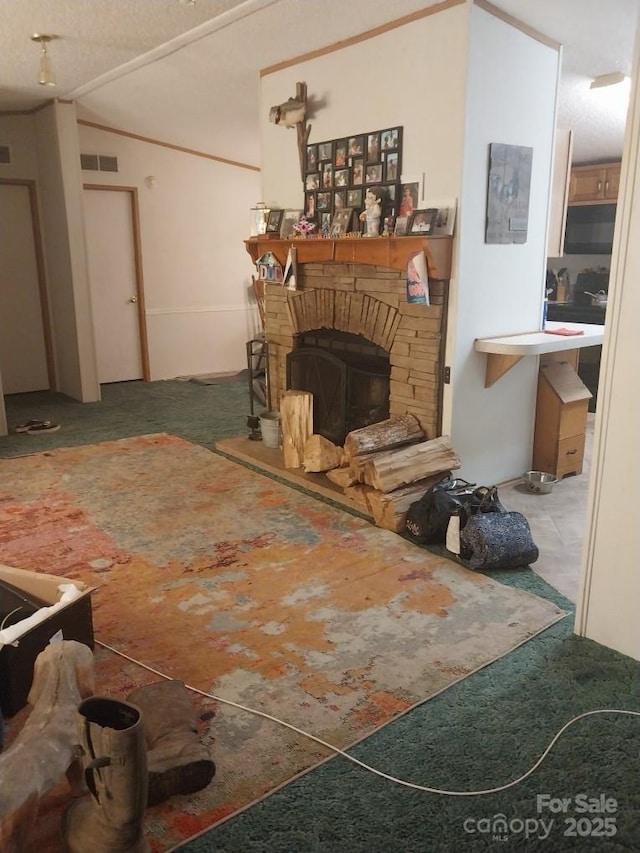 living room featuring a brick fireplace