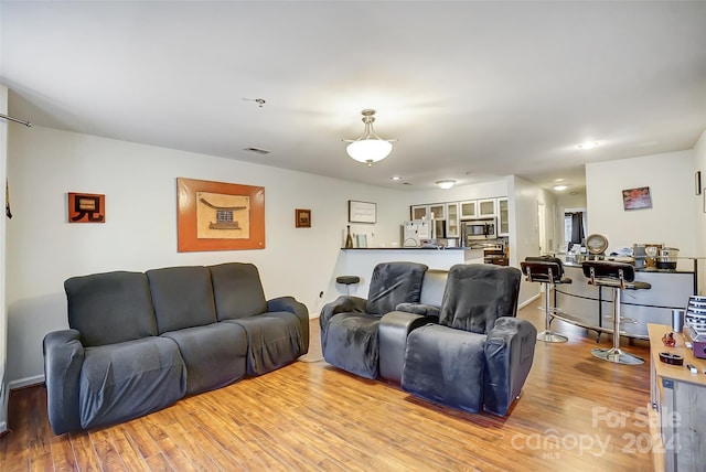 living room with light wood-type flooring