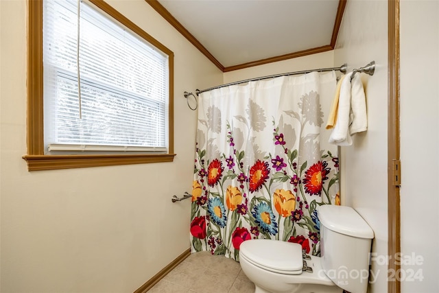 bathroom featuring tile patterned floors, toilet, ornamental molding, and a shower with shower curtain