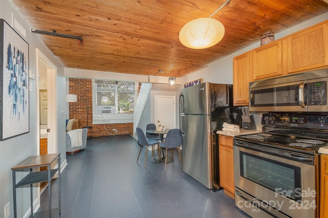 kitchen featuring decorative light fixtures, brick wall, wood ceiling, and appliances with stainless steel finishes