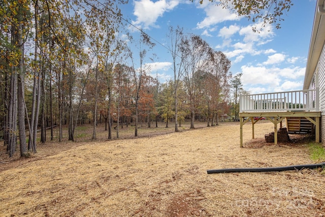 view of yard with a deck