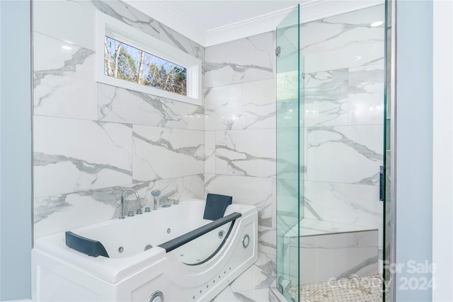 bathroom featuring crown molding and a tub