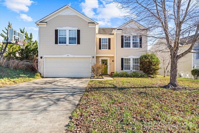 view of front of house featuring a garage and a front lawn