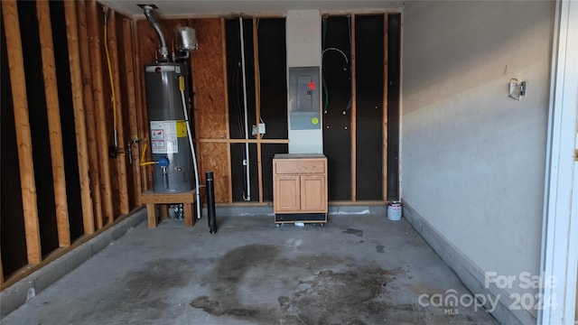 interior space with electric panel and gas water heater