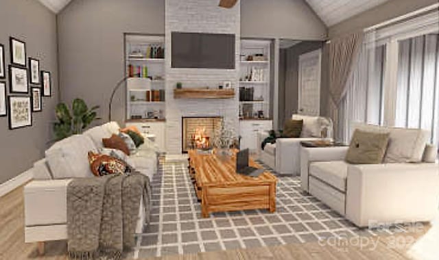 living room with ceiling fan, lofted ceiling, and a fireplace