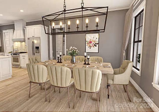 dining area featuring a chandelier, light hardwood / wood-style floors, and crown molding