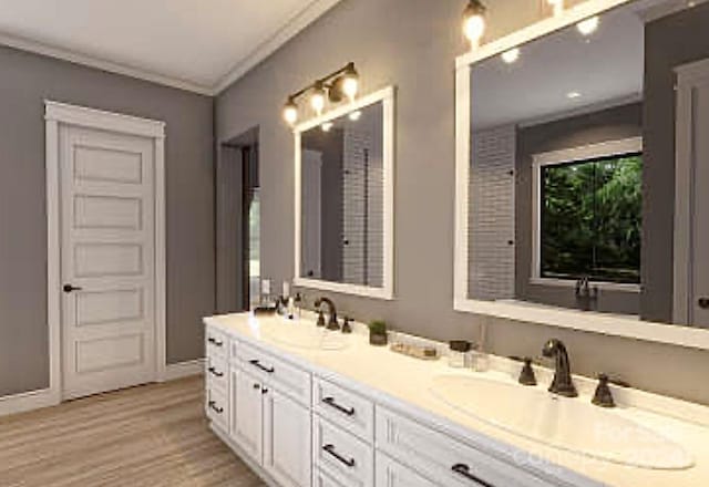 bathroom featuring vanity, ornamental molding, and hardwood / wood-style flooring