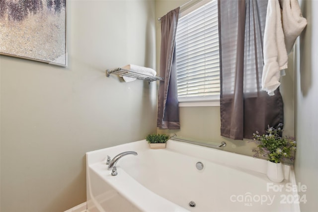 bathroom featuring a tub