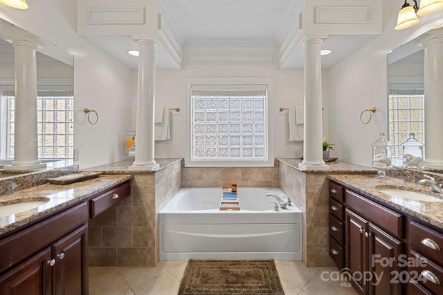 bathroom featuring tile patterned floors and a healthy amount of sunlight