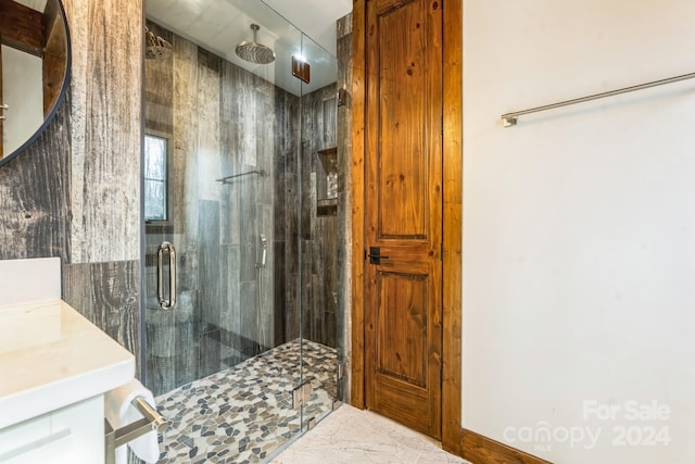 bathroom with vanity and walk in shower