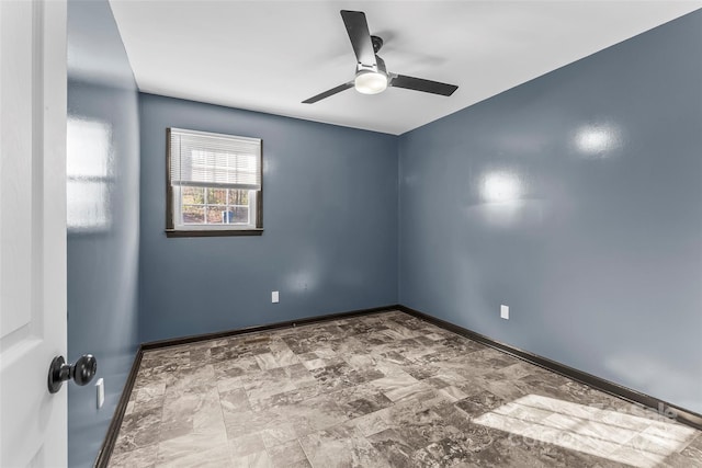 unfurnished room with ceiling fan