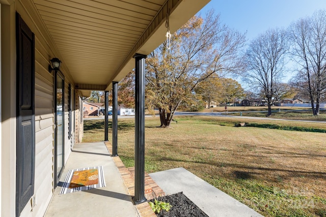 view of yard featuring a porch