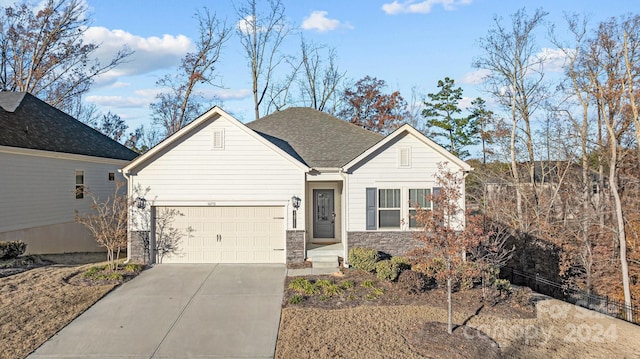 view of front of property with a garage