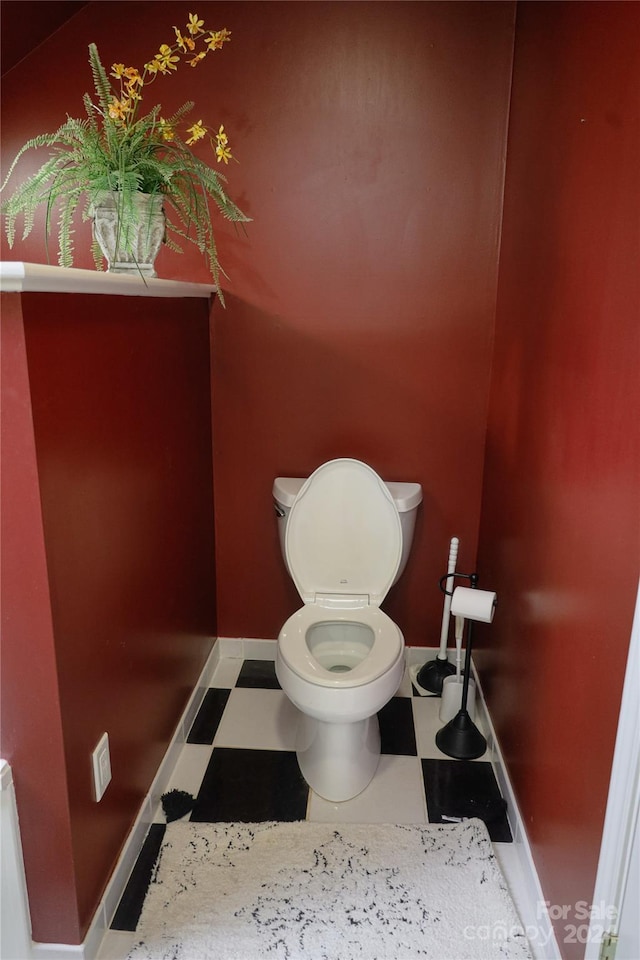 bathroom featuring toilet