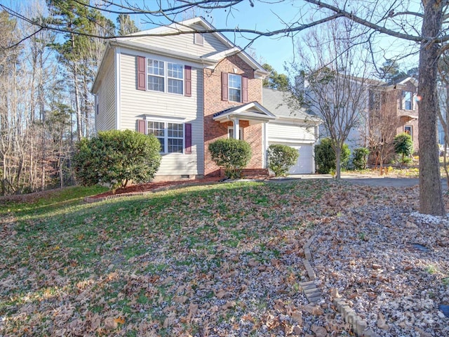 view of property featuring a front lawn