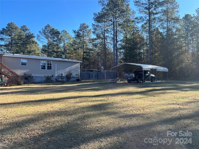 view of yard featuring a carport