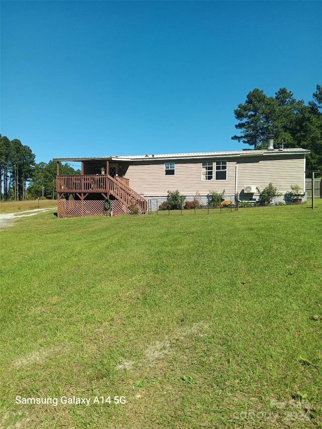 exterior space featuring a deck and a front yard