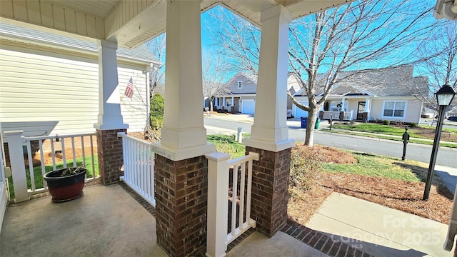 view of patio featuring a porch