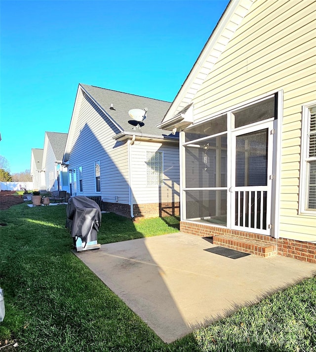 exterior space featuring a sunroom