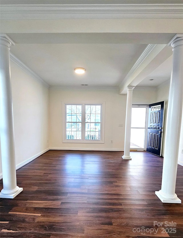 unfurnished living room featuring dark hardwood / wood-style floors and crown molding