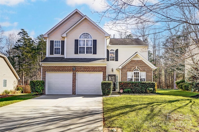 front facade featuring a front yard and a garage