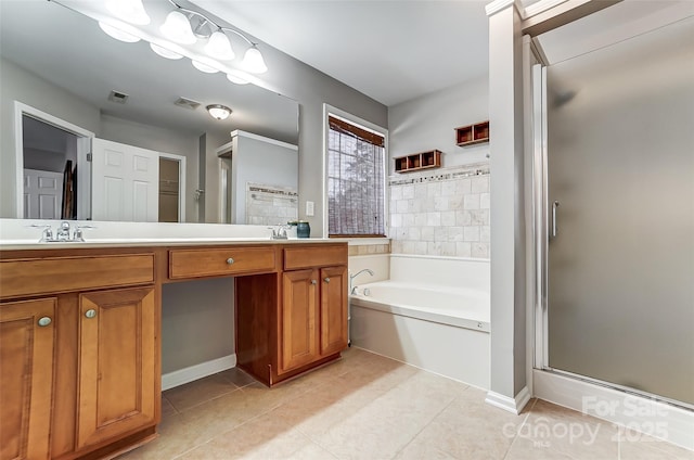 bathroom with tile patterned floors, vanity, and separate shower and tub