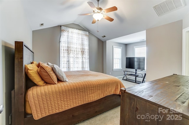 bedroom featuring light carpet, ceiling fan, and lofted ceiling