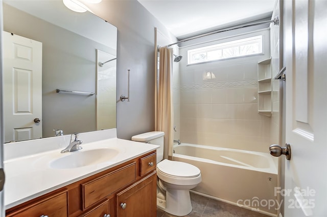 full bathroom featuring toilet, vanity, tile patterned floors, and shower / bath combo with shower curtain