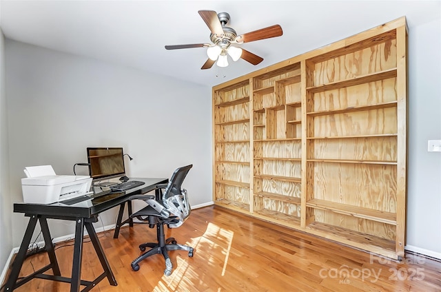 home office featuring ceiling fan and hardwood / wood-style floors