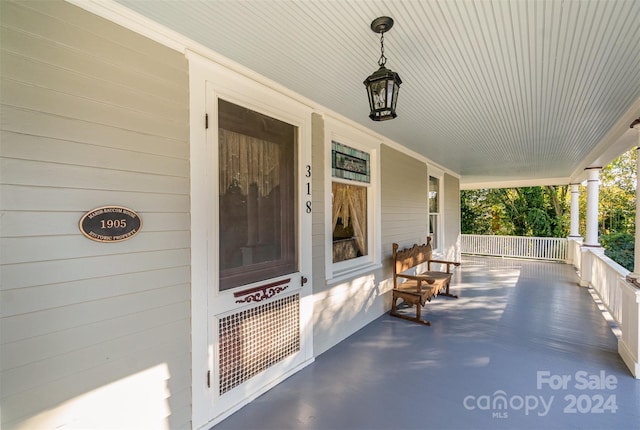 view of patio featuring a porch