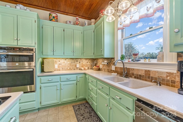 318 N Elm St, Marshville, NC 28103 - kitchen with wood ceiling, stainless steel appliances, light countertops, light tile patterned flooring, and tasteful backsplash