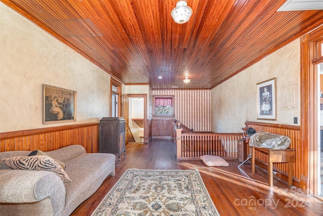 318 N Elm St, Marshville, NC 28103 - living area featuring wood ceiling, wood-type flooring, ornamental molding, an upstairs landing, and a wainscoted wall