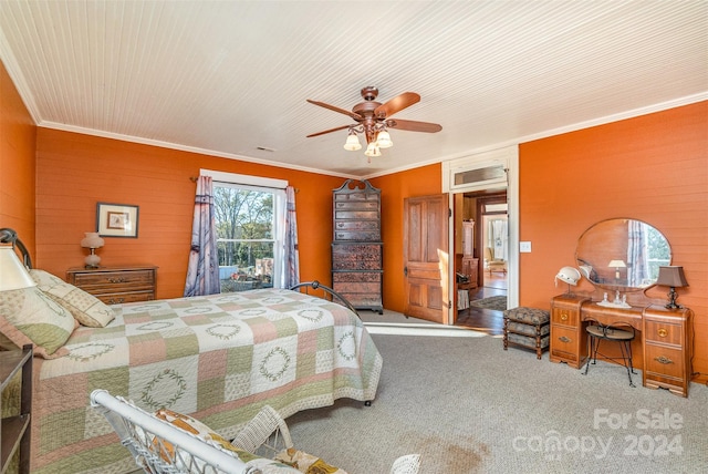 bedroom with carpet flooring, ceiling fan, and ornamental molding