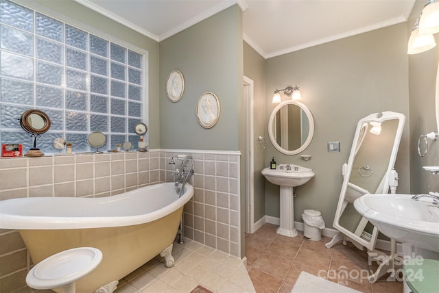 318 N Elm St, Marshville, NC 28103 - full bathroom featuring a freestanding tub, tile patterned flooring, tile walls, and crown molding