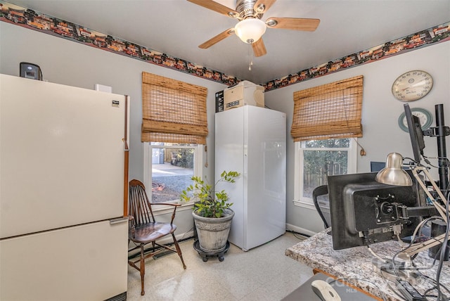 318 N Elm St, Marshville, NC 28103 - kitchen featuring freestanding refrigerator, tile patterned floors, a ceiling fan, and plenty of natural light