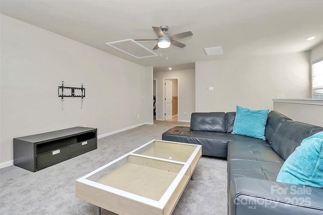 living room featuring ceiling fan and carpet flooring