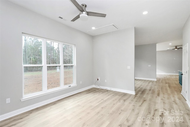 empty room with light wood-type flooring