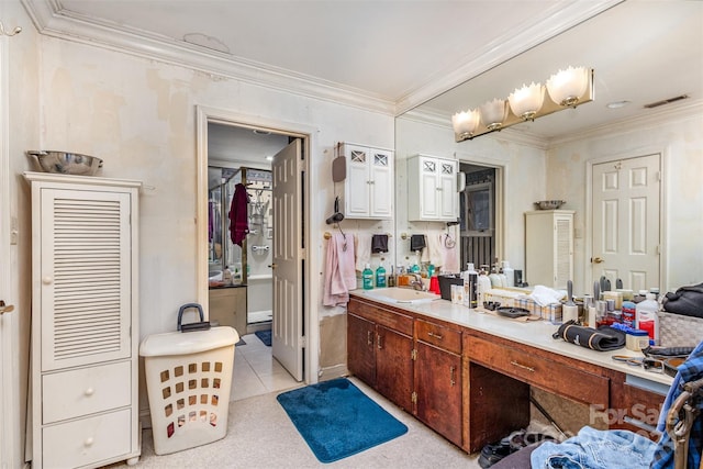 bathroom with tile patterned flooring, vanity, and ornamental molding