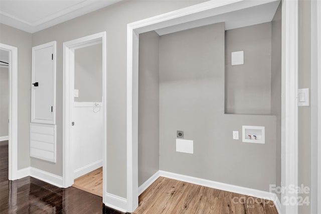 laundry area with wood-type flooring, hookup for a washing machine, and electric dryer hookup