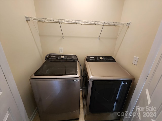 laundry room with washer and dryer