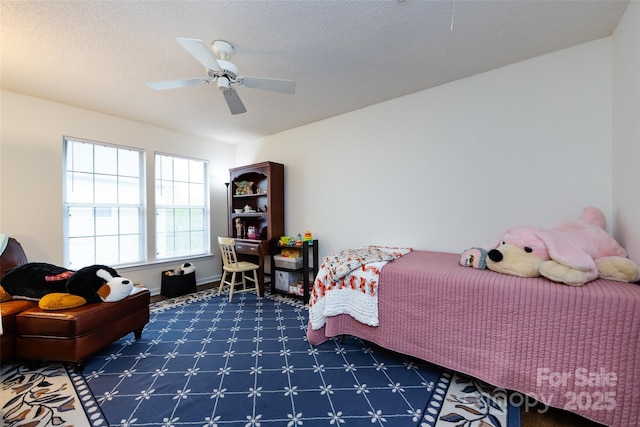 bedroom featuring ceiling fan and carpet flooring