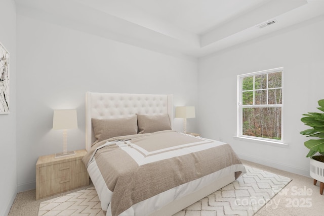 bedroom featuring light carpet