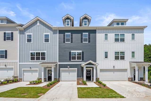 190 Cherry Springs Ln Unit 1-E, Asheville, NC 28804 - townhome / multi-family property featuring board and batten siding, stone siding, and a garage